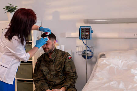Providing critical care to a Soldier in a Hospital requires dedication and compassionの写真素材