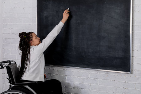 Empowered Education The Journey of Writing on a Chalkboard from a Wheelchair Perspective