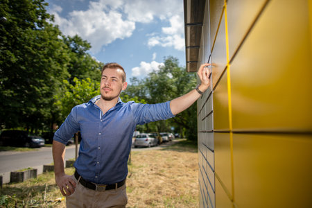 A Confident Young Man Posing Outdoors in a Stylish Shirt, Radiating Charm and Style
