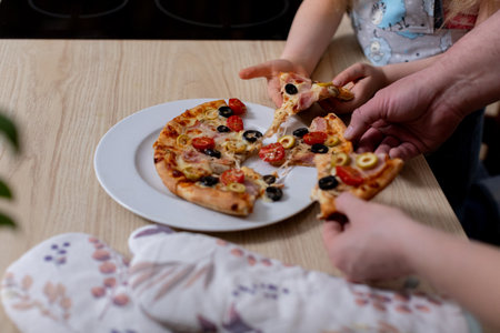 Gathering Together for Family Pizza Sharing and Enjoyment at Home During the Weekend