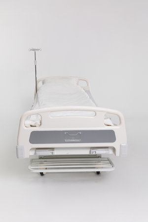 A Clean Hospital Bed for Patient Care, Recovery, and Overall Wellbeing Improvementの写真素材