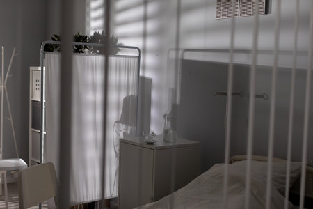 A peaceful and serene hospital room featuring soft lighting, with a minimalist design approach,の写真素材
