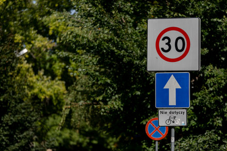Traffic Signs Indicating Speed Limit and Direction on the Roadways for Vehicles and Drivers