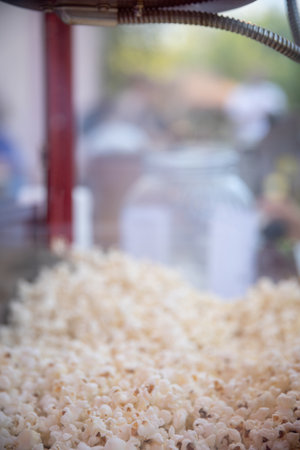 Indulge in Freshly Popped Popcorn from a Charming Vintage Popcorn Machine that Cooks itの写真素材