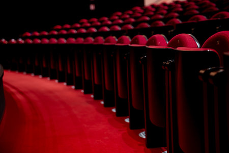 An Elegant and Stylish Red Theater Seating Arrangement for a Memorable Experienceの写真素材
