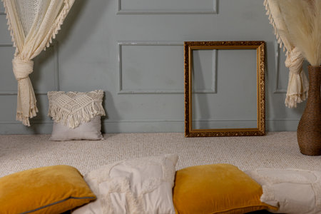 An Elegant and Cozy Interior Space Featuring a Decorative Frame Alongside Cushions