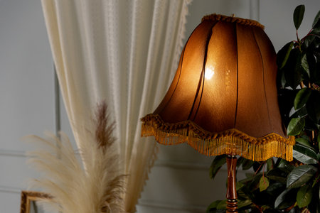 This Vintage Style Table Lamp emits a Warm Glow, ideal for enhancing any Elegant Interiorの写真素材