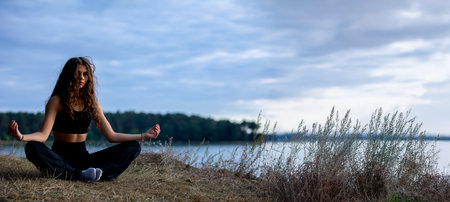 Meditation by the Lakeside Embracing Natures Serenity for Inner Peace and Calm Reflectionの写真素材