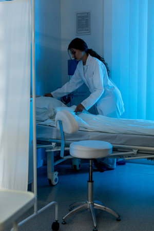 A Medical Professional is Attending to the Patient in a Hospital Room for Care and Support