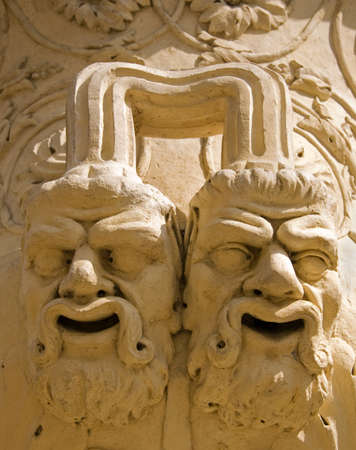 Closeup of gargoyles on the vase