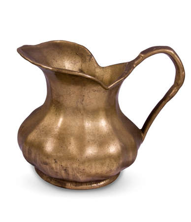 Old brass retro pitcher isolated on whiteの写真素材