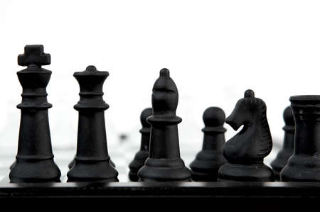 Stone Chess on the chessboard. White blurredの写真素材