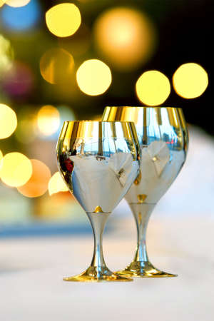 Two shiny metal cups onblurred backgroundの写真素材