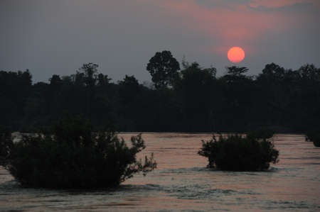 Sunset at river Mekong on the four thousend islands, Laosの写真素材