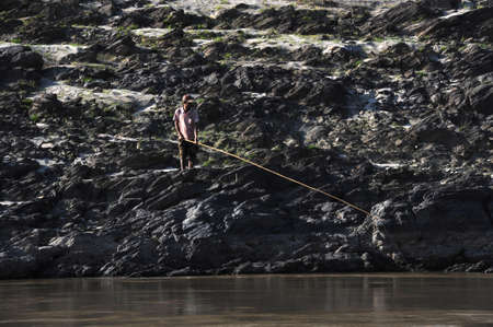 Fishermen at river Mekong on Laosのeditorial素材
