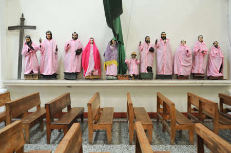 Sculptures of the apostles on the church at Santiago de Atitlan on Guatemalaの写真素材