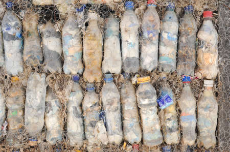 Wall with pet bottles at San Marcos la lagunaの写真素材