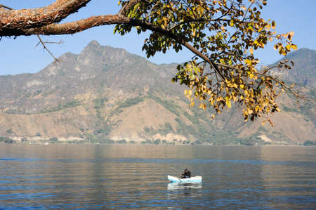 San Pedro la Laguna, Guatemala - 10 February 2014  Mayan indigenous fishing on his canoe at San Pedro on lake Atitlan, Guatemalaのeditorial素材