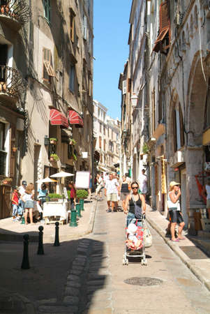 Bonifacio,Corsica,France - 18 July 2006: Tourists walking on the street in the Citadel of Bonifacio on the island of Carsica, Franceのeditorial素材