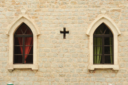 Windows of the church of St  John at Budva on Montenegroの写真素材