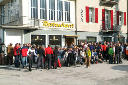Engelberg, Switzerland - 8 April 2006: People drinking on a restaurant after skiing at Engelberg on the Swiss alpsのeditorial素材