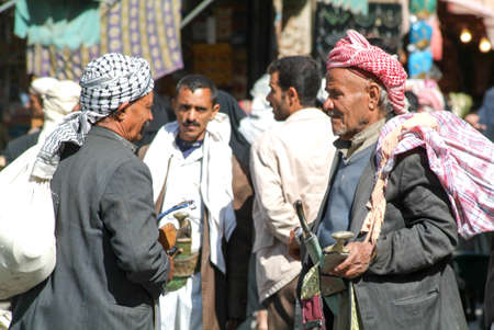 Sana, Yemen - 19 January 2008: people in conversation on the main square of old Sana on Yemenのeditorial素材