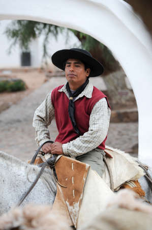 PURMAMARCA, ARGENTINA - 27 January 2011: Gauchos on traditional festival in Purmamarca, province Jujuy, northen Argentinaのeditorial素材