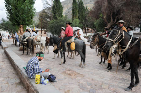 PURMAMARCA, ARGENTINA - 27 January 2011: Gauchos on traditional festival in Purmamarca, province Jujuy, northen Argentinaのeditorial素材