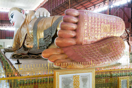 Big lying Buddha at the pagoda Chaukhtatgy of Yangon on Myanmarのeditorial素材