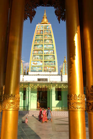 Yangon, Myanmar - 9 January 2010: People walking in the area of the Shwedagon Pagoda in Yangon on Myanmarのeditorial素材