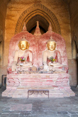 Statue of Buddha on Dhammayangyi temple at the archaeological site of Bagan on Myanmarのeditorial素材