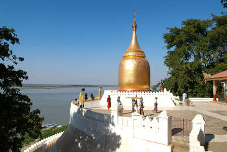 Bagan, Myanmar 23 January 2010: Tourists walking in front of Bu Paya pagoda at the archaeological site of Bagan on Myanmarのeditorial素材