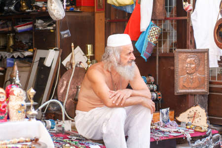 Mostar, Bosnia Herzegovina - 2 September 2004: Man owner of a gift shops at Mostarのeditorial素材