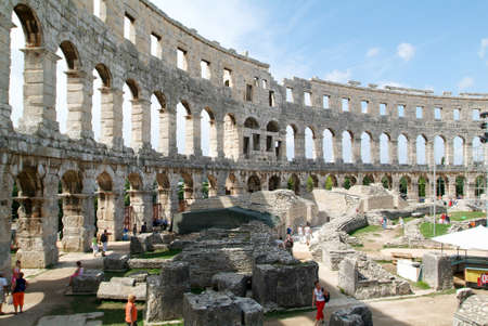 Pula, Croatia - August 23, 2005: tourists walking on the ruins of Roman amphitheater at Pula on Croatiaのeditorial素材
