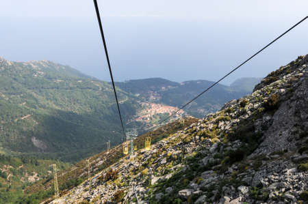 Mount Capanne, Italy - 7 July 2011: People on the cable car going up mount Capanne on Elba island, Italyのeditorial素材