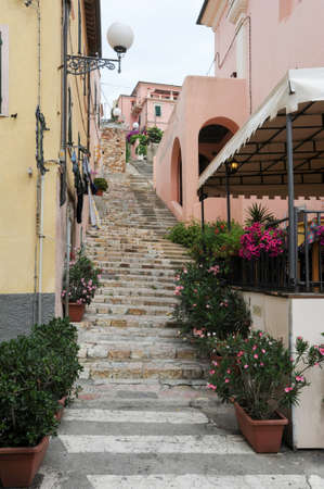 ITALY, PORTOFERRAIO - 4 july 2011: Alley of Portoferraio on Elba island, Italyのeditorial素材