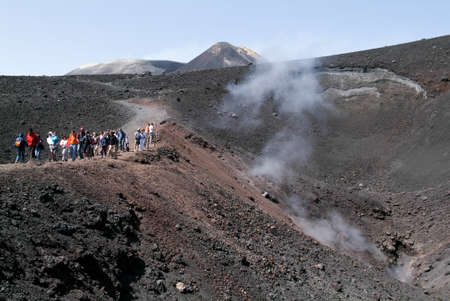 People hiking at mount Etna in the island of Sicily, Italyのeditorial素材