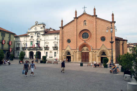 Asti, Italy - 17 July 2010: People walking in front of the  church at Asti on Italyのeditorial素材