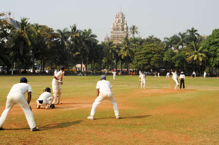 Mumbai, India - 5 january 2015: People playing cricket in the central park at Mumbai, Indiaのeditorial素材