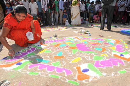 Hampi, India - 11 January 2015: Woman during a street design competition at Hampi on Indiaのeditorial素材