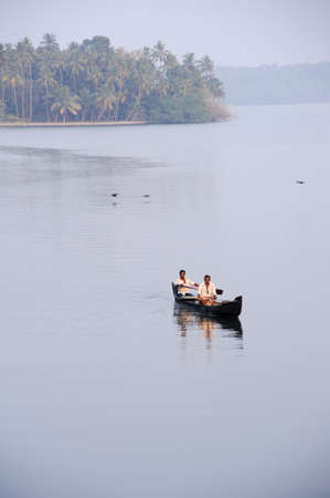Kollam, India - 19 January 2015: People cruising on a canoe a river of the backwaters at Kollam on Indiaのeditorial素材