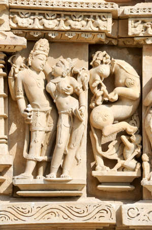 Detail of artwork at the Khajuraho temple on Indiaの写真素材