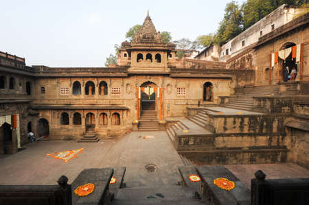 Maheshwar, India - 4 February 2015: People walking in front of Maheshwar palace on Indiaのeditorial素材