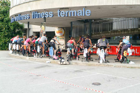 Lugano, Switzerland -24 June 2005: People pedaling during a spinning classのeditorial素材