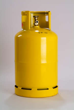 Yellow gas bottle isolatedの写真素材