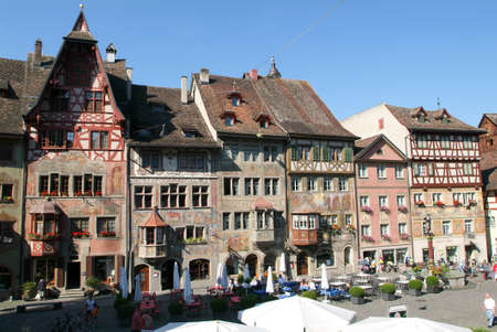 Stein am Rhein, Switzerland - 27 August 2008: People wanking and sitting on restaurants at the old...