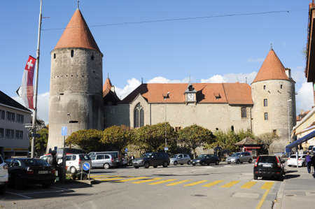 Yverdon-les-Bains, Switzerland - 30 October 2013: People walking in front of the medieval castle at Yverdon-les-Bains on Switzerlandのeditorial素材
