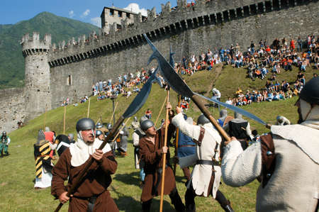 Bellinzona,Switzerland - 29 May 2004: Knights in action during the annual medieval Festival "la spada nella roccia at the castle of Montebello in Bellinzona, Switzerlandのeditorial素材