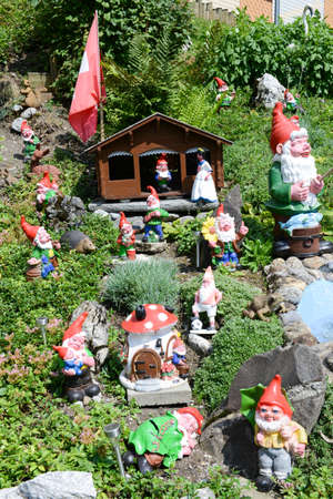 Garden gnomes in a garden of a house at Engelberg on the Swiss alpsの写真素材