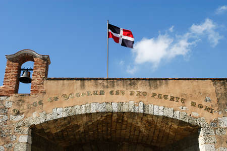 Colonial door with dominican flag at Santo domingo on Dominican Republicの写真素材